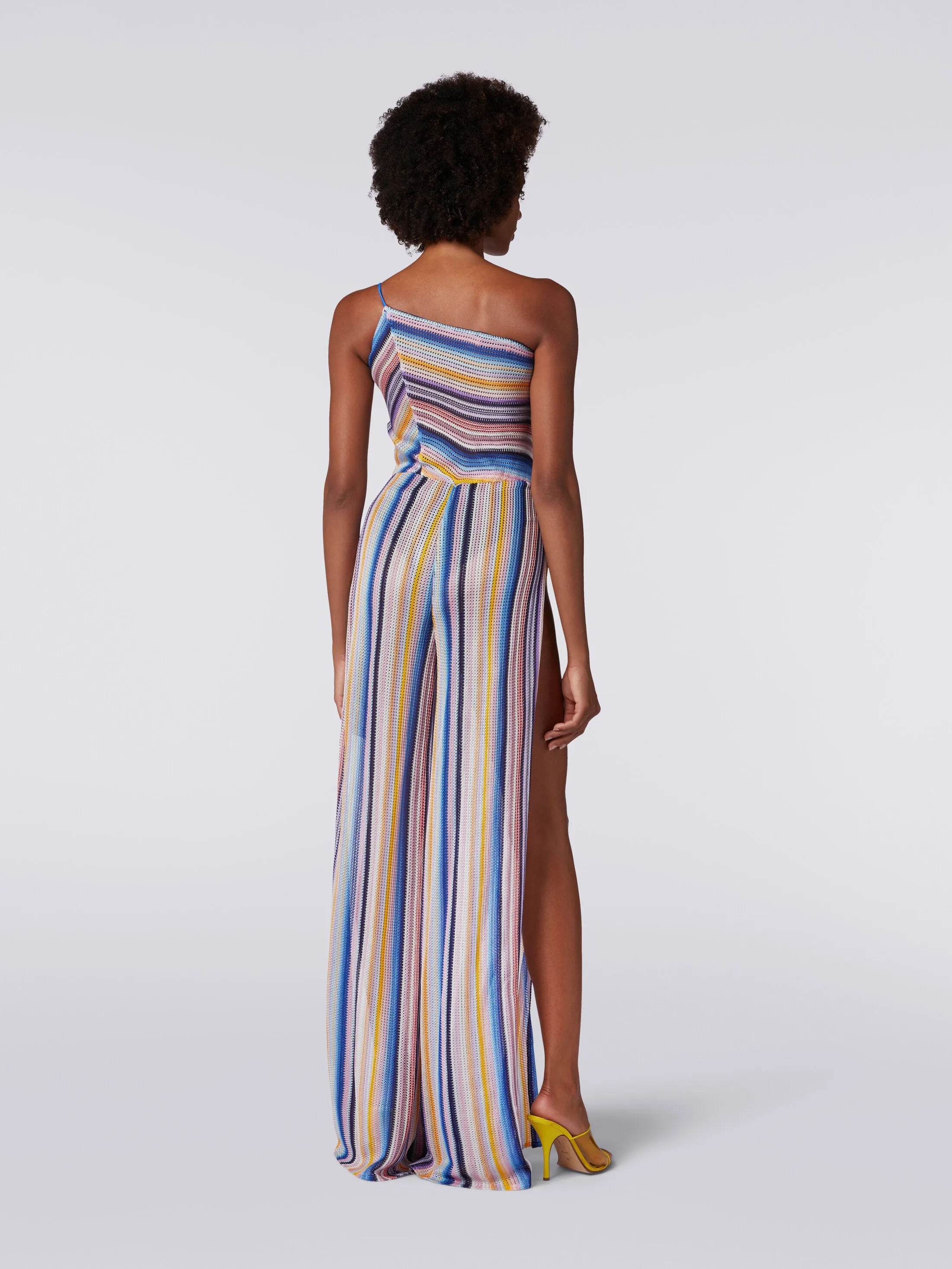 Tuta pantalone monospalla in crochet rigato
